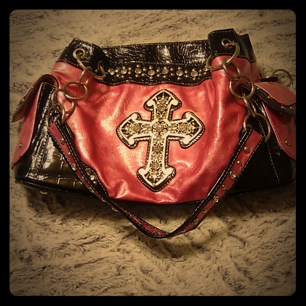 Purse with a cross.